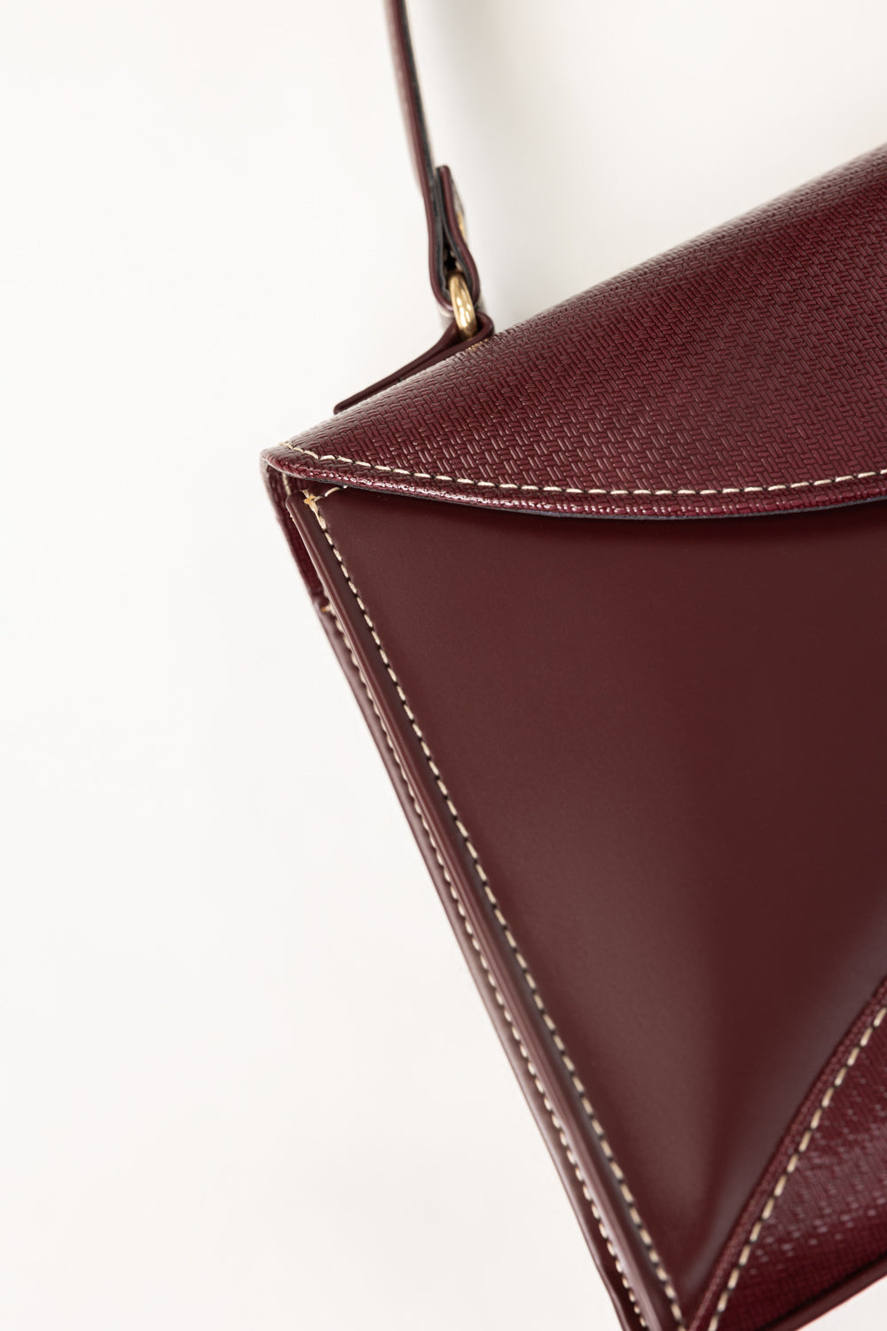 Maroon Structured Faux Leather Handbag with Tassel Detail-Zavy Vibes