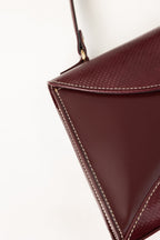 Maroon Structured Faux Leather Handbag with Tassel Detail-Zavy Vibes