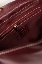 Maroon Structured Faux Leather Handbag with Tassel Detail-Zavy Vibes