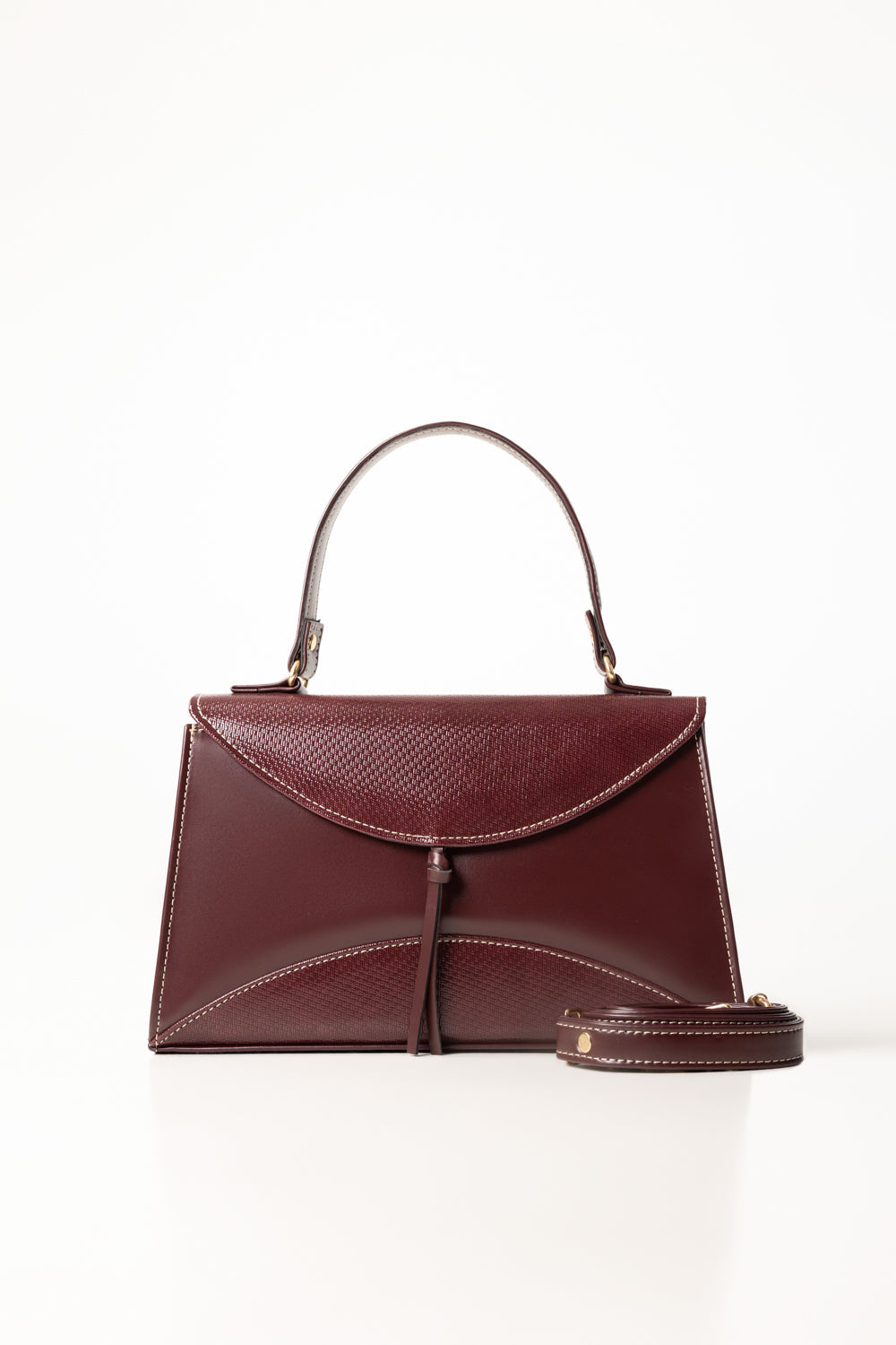 Maroon Structured Faux Leather Handbag with Tassel Detail-Zavy Vibes